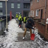 Jews and Muslims in East London shovelling snow on a freezing cold Sadaqa Day