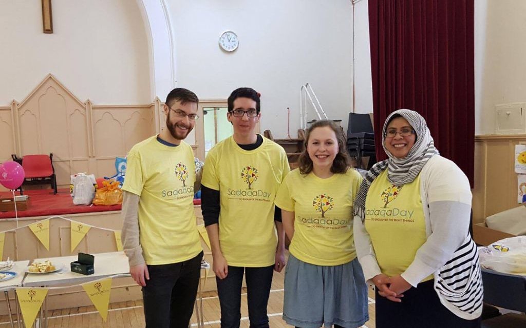 Members of Glasgow University Jewish Society and the Scottish Police Muslim Association at Hillington Park Parish Church donating food parcels to the Glasgow SW Food Bank