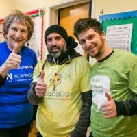 Norwood's Gloria Stoll, Nayim Kadri from Hendon Mosque and Justin Copitch at the Norwood project packing for Sufra NW with JVN - photo by Yakir Zur