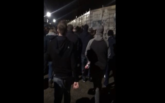 A fan outside the San Siro stadium took the footage of the Arsenal supporter singing the anti-Semitic song