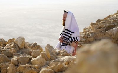A Cast member praying at the top of Masada in the programme, Kibbutz, in which eight British Jews "go on a journey to examine some of the most pressing questions facing the Jewish community in 2018", part of the new BBC2 season line up.  

(Photo credit: Strahila Royachka/BBC/PA Wire)