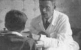 Asperger performing a psychological test on a child at the University Pediatric Clinic, Vienna during the Third Reich c. 1940.
(Wikimedia Commons)