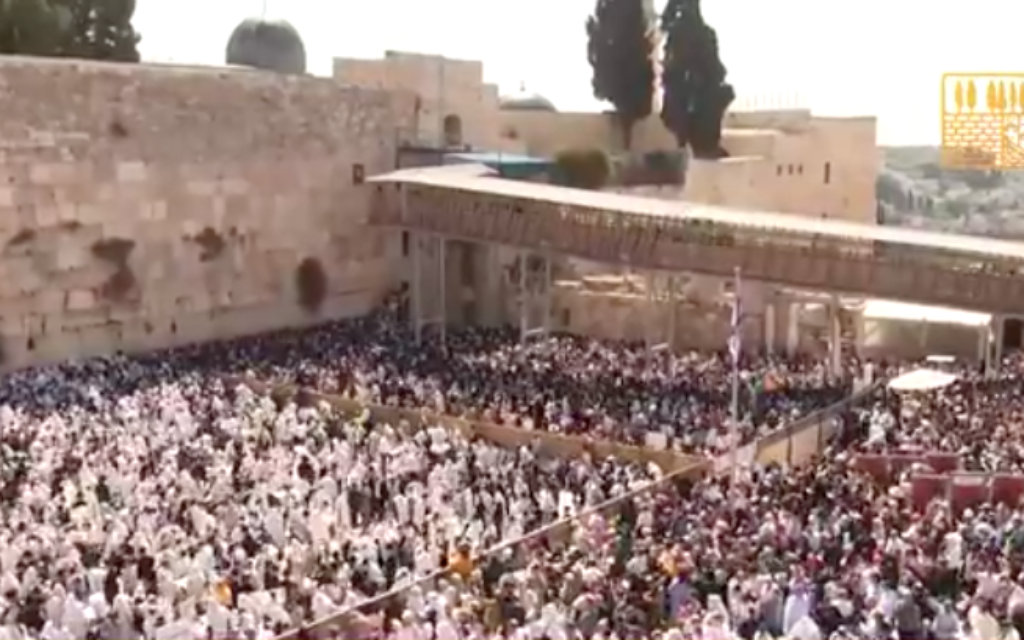 Thousands packed into the Western Wall plaza for the priestly blessing