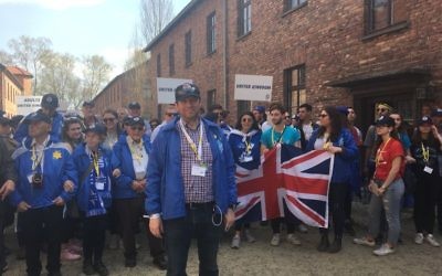 Scott Saunders, chair of March of the Living UK, stands in Auschwitz ready to lead the UK delegation on the 1.5 mile march