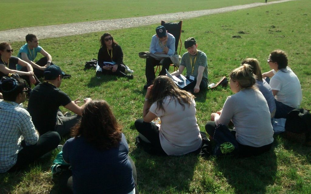 Richard Verber, sitting alongside Holocaust Survivor Harry Olmer, describing the layout of the Majdanek Death Camp