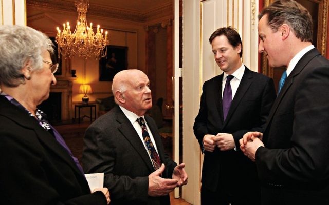 Sir Ben speaking with former PM David Cameron and Deputy PM Nick Clegg
