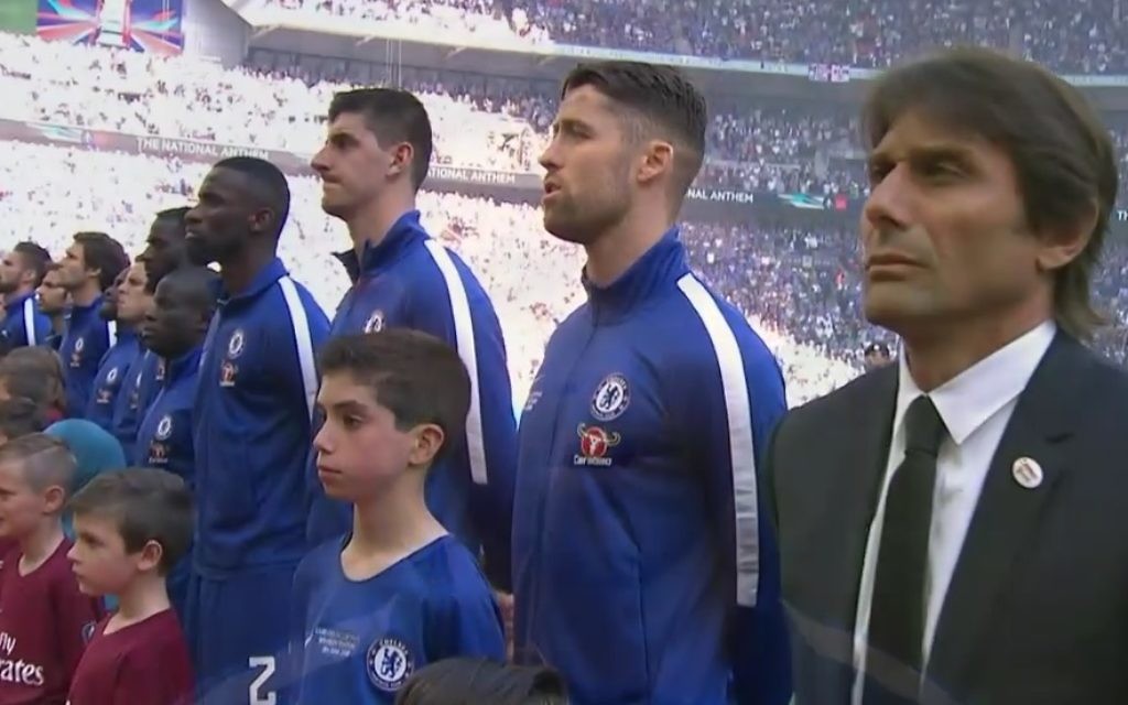 Jacob lines up during the playing of the national anthem prior to kick-off