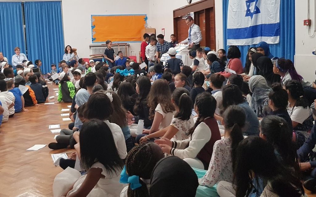 Pupils at King David Elementary School in Birmingham celebrating Israel's 70th anniversary on April 19, 2018. 

Credit: Cnaan Liphshiz - JTA