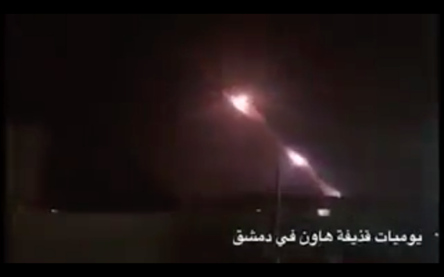 Screenshot from video via Times of Israel, showing missiles being launched at Israel