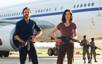 Daniel Brühl and Rosamund Pike, above, as German hijackers in Entebbe, directed by Brazilian José Padilha