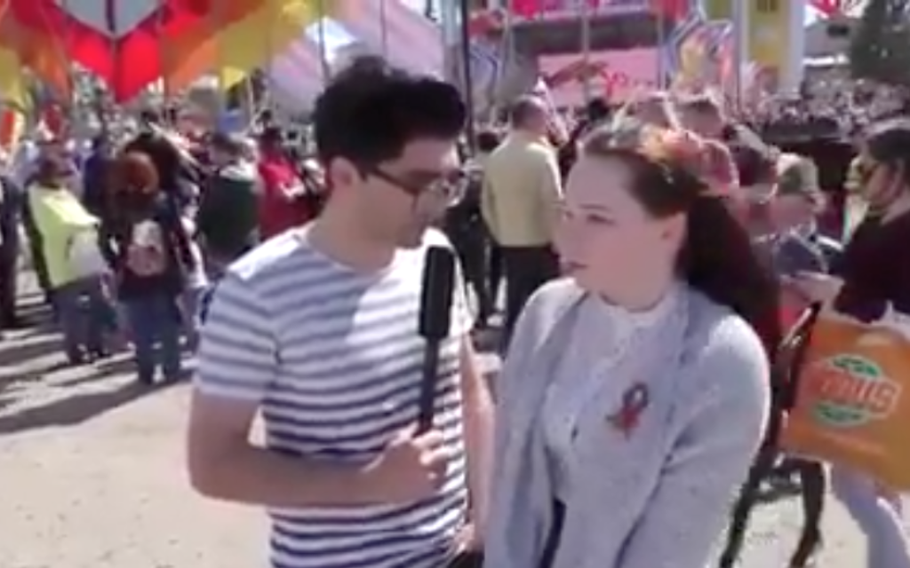 Nijat Safarli tricking a reveller at the WWII parade into celebrating the Holocaust