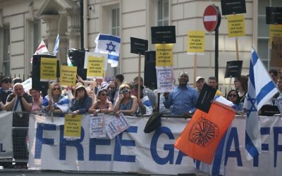 A counter-protest against pro-Palestinian demonstrators outside the Embassy of Saudi Arabia, London, during an Al-Quds Day march in support of Palestinians. PRESS ASSOCIATION Photo. Picture date: Sunday June 10, 2018. See PA story PROTEST Flags. Photo credit should read: Yui Mok/PA Wire