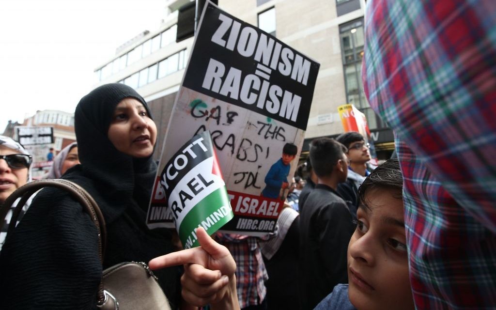 Pro-Palestinian demonstrators outside the Embassy of Saudi Arabia, London, during an Al-Quds Day march in support of Palestinians. 

Photo credit: Yui Mok/PA Wire
