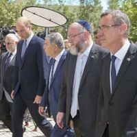 The Duke of Cambridge (second left) and Ephraim Mirvis (second right), chief rabbi in the UK, arriving at the Yad Vashem Holocaust Memorial and Museum in Jerusalem, Israel's official memorial to the Jewish victims of the Holocaust, as part of his tour of the Middle East. 

Photo credit: Ian Vogler/Daily Mirror/PA Wire
