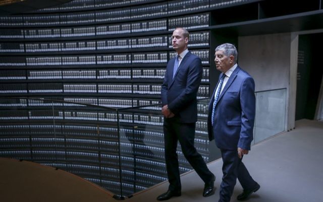 The Duke of Cambridge (left) views the Hall of Names, during a visit to the Yad Vashem Holocaust Memorial and Museum in Jerusalem, Israel's official memorial to the Jewish victims of the Holocaust, as part of his tour of the Middle East.  

Photo credit: Ian Vogler/Daily Mirror/PA Wire