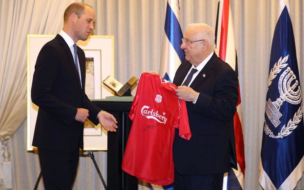 The Duke of Cambridge presents Israeli President Reuven Rivlin with a Liverpool FC shirt, signed by Steven Gerrard, during an audience at his official residence in Jerusalem, Israel.

Photo credit: Chris Jackson/PA Wire
