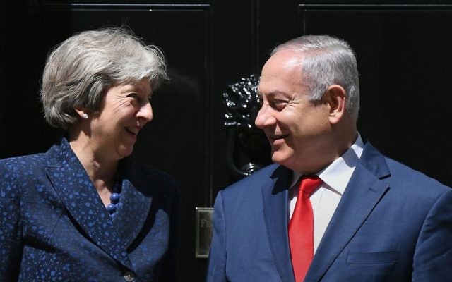 Prime Minister Theresa May greets Israeli Prime Minister Benjamin Netanyahu to 10 Downing Street, London, ahead of a bilateral meeting. 

Photo credit: Stefan Rousseau/PA Wire
