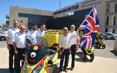 MDA staff show off their brand new medicycle presented to Prince William to commemorate the first Royal visit to Israel. MDA staff show off their brand new medicycle presented to Prince William to commemorate the first Royal visit to Israel.