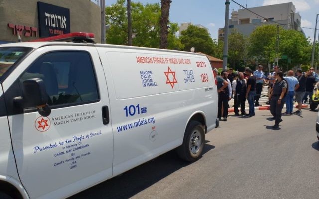 Emergency ambulance from Magen David Adom arrives at the seen of a stabbing