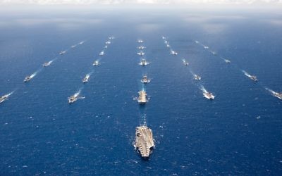 Official U.S. Navy file photo of ships and submarines participating in Rim of the Pacific in formation in the waters around the Hawaiian islands