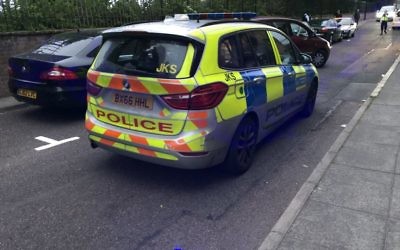 Police attend to the incident in Stamford Hill, after a woman reportedly ran at children with a knife, shouting anti-Semitic slurs