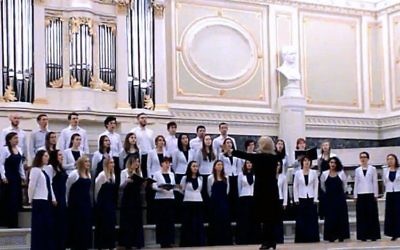 EVA Choir dressed in White Jackets, will sing with the Zemel choir