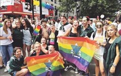 Loud and proud: Jewish participants at London Pride with Bromley Reform Synagogue's Rabbi Laura Janner-Klausner (centre) Loud and proud: Jewish participants at London Pride with Bromley Reform Synagogue's Rabbi Laura Janner-Klausner (centre)