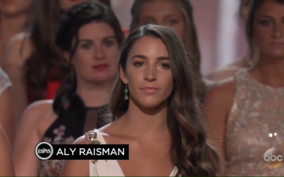 Aly Raisman speaking on behalf of 140 gymnasts at the awards.