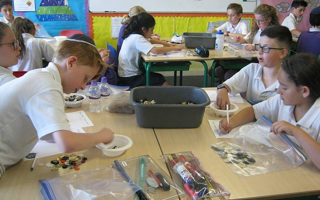 Year 6 students at HJPS, Radlett counted 51,335 buttons Year 6 students at HJPS, Radlett counted 51,335 buttons