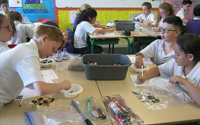Year 6 students at HJPS, Radlett counted 51,335 buttons