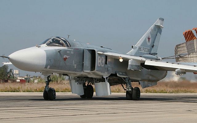 Syrian Sukhoi warplane on the tarmac at a an airbase in Syria