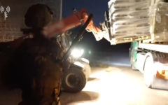 Screenshot from video of IDF soldiers helping distribute medicine, food and equipment to Syrians Screenshot from video of IDF soldiers helping distribute medicine, food and equipment to Syrians
