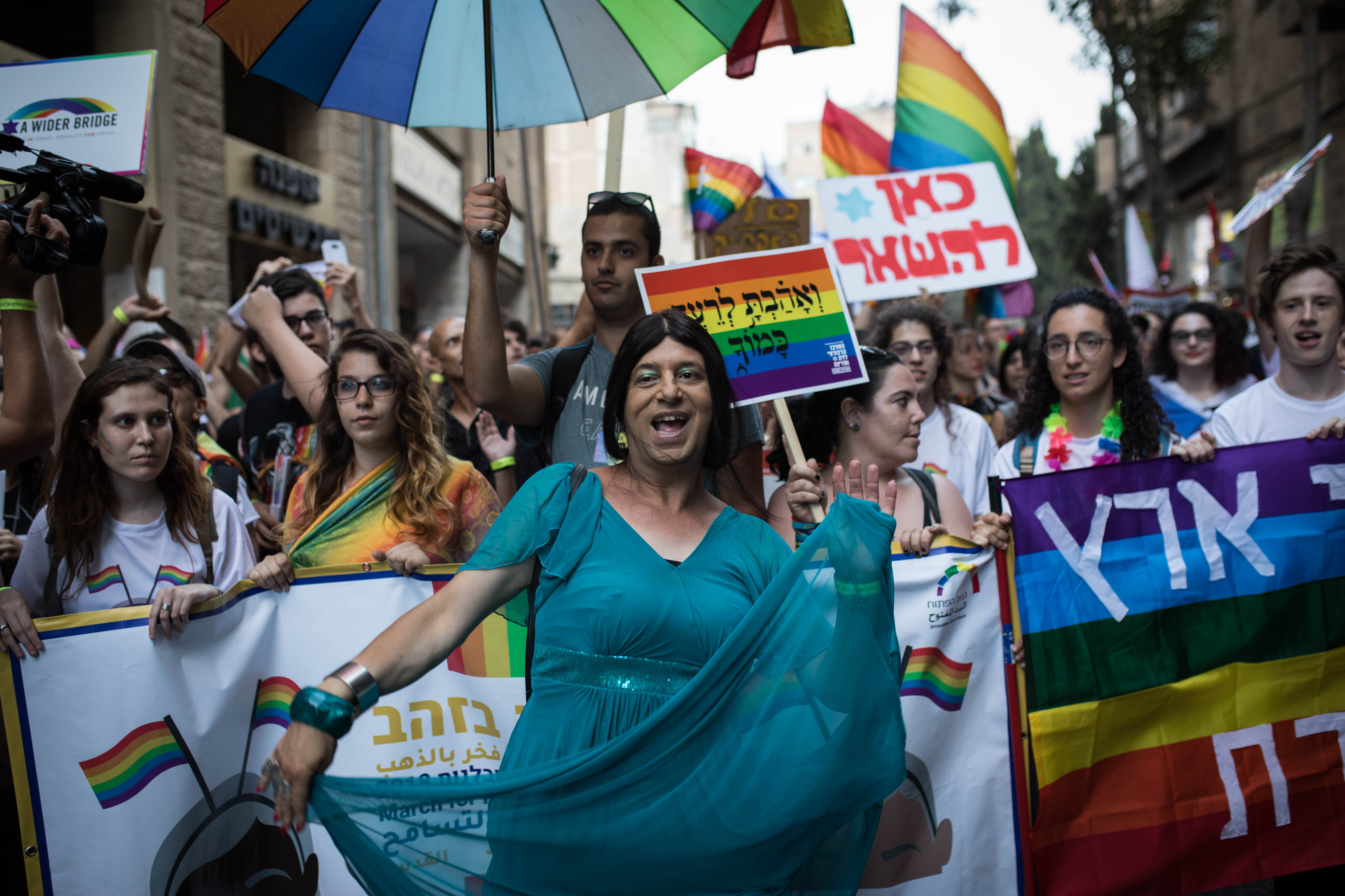 Participants take part in the annual Jerusalem Gay Pride parade on August 2, 2018.   This year's parade, the 17th annual Jerusalem march, is being held under the banner of "Pride and Tolerance". Photo by: JINIPIX