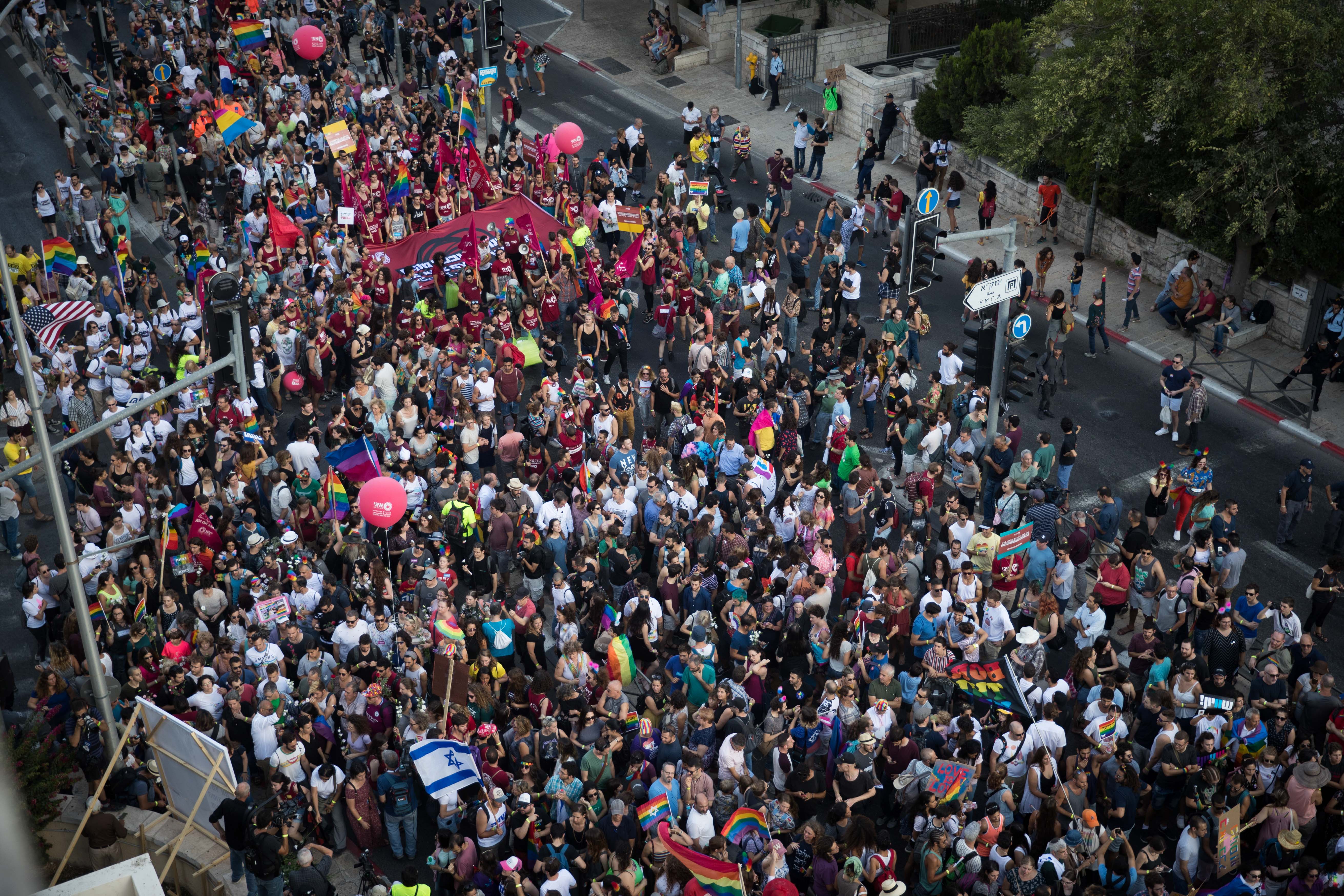 Participants take part in the annual Jerusalem Gay Pride parade on August 2, 2018.   This year's parade, the 17th annual Jerusalem march, is being held under the banner of "Pride and Tolerance". Photo by: JINIPIX