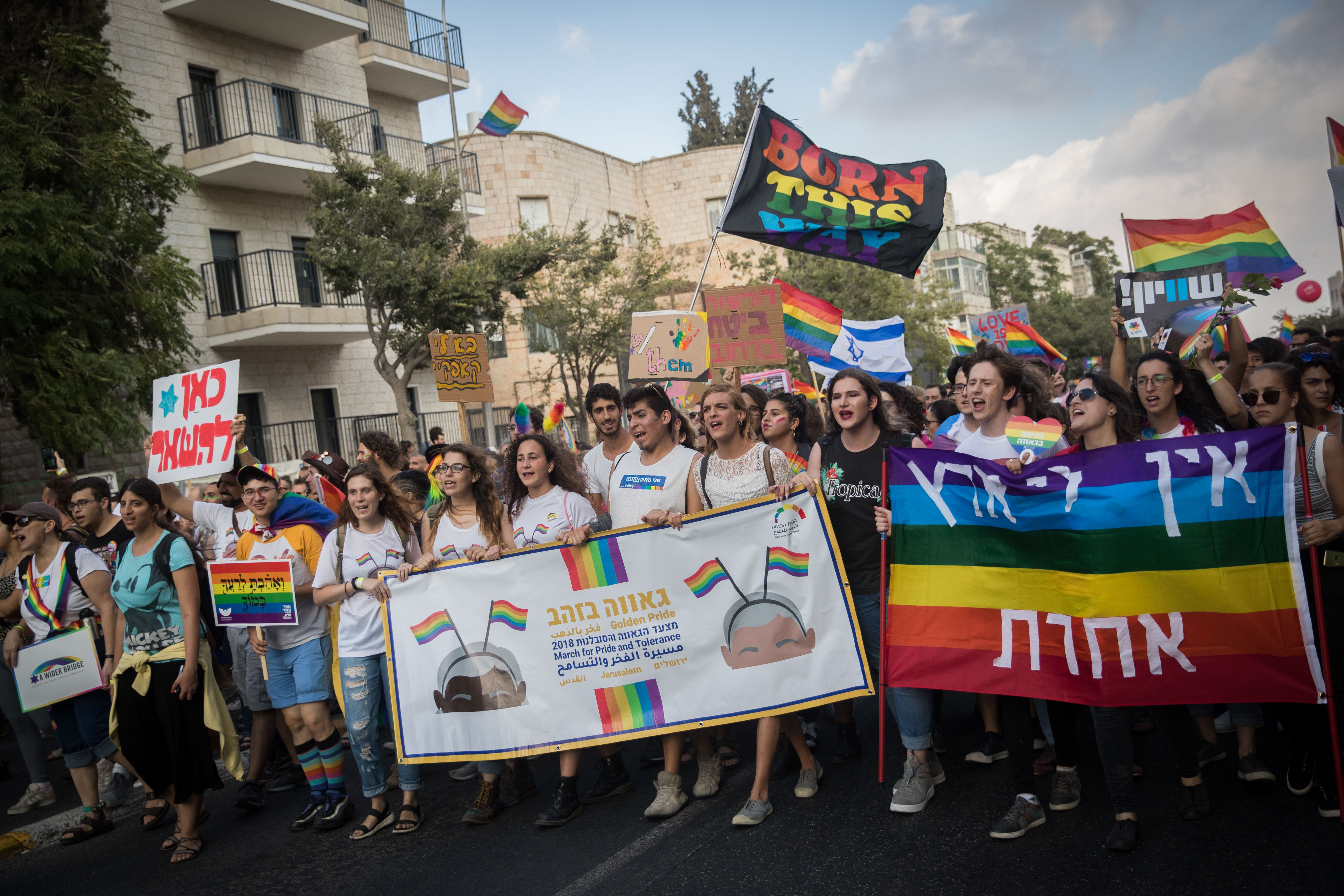 Participants take part in the annual Jerusalem Gay Pride parade on August 2, 2018.   This year's parade, the 17th annual Jerusalem march, is being held under the banner of "Pride and Tolerance". Photo by: JINIPIX