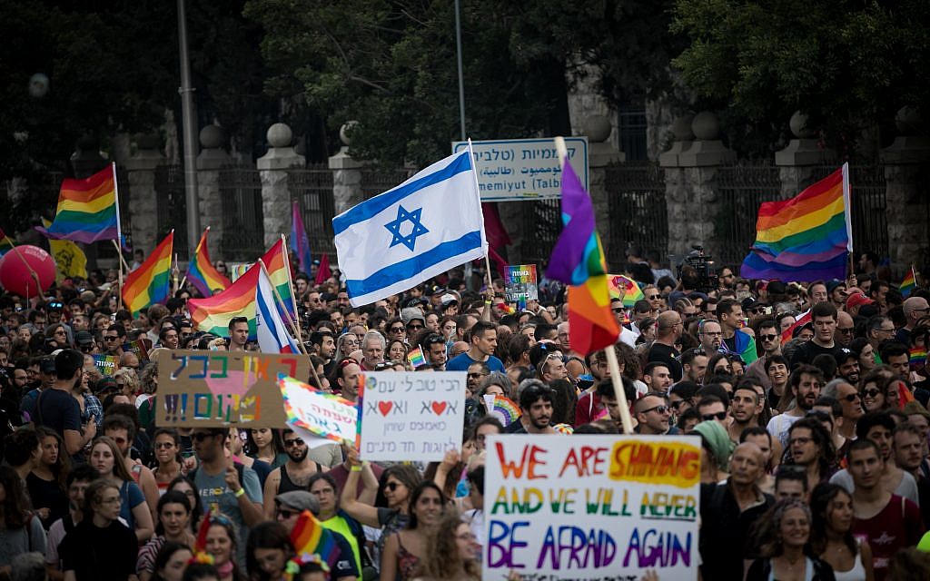 Participants take part in the annual Jerusalem Gay Pride parade on August 2, 2018.   This year's parade, the 17th annual Jerusalem march, is being held under the banner of "Pride and Tolerance". Photo by: JINIPIX