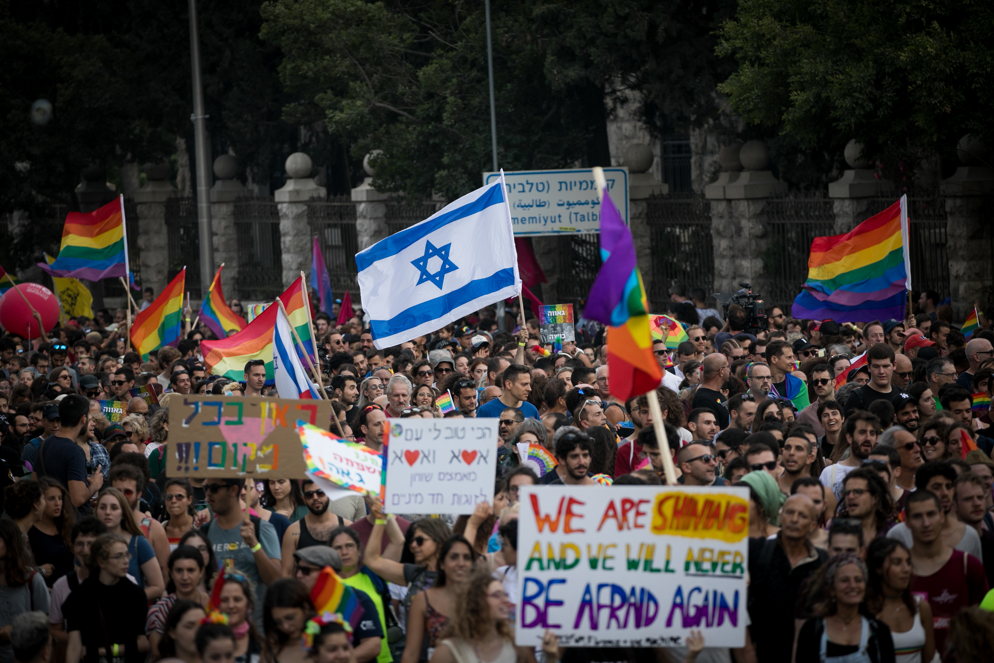 Participants take part in the annual Jerusalem Gay Pride parade on August 2, 2018.   This year's parade, the 17th annual Jerusalem march, is being held under the banner of "Pride and Tolerance". Photo by: JINIPIX