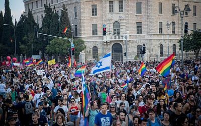 Participants take part in the annual Jerusalem Gay Pride parade on August 2, 2018.   This year's parade, the 17th annual Jerusalem march, is being held under the banner of "Pride and Tolerance". Photo by: JINIPIX
