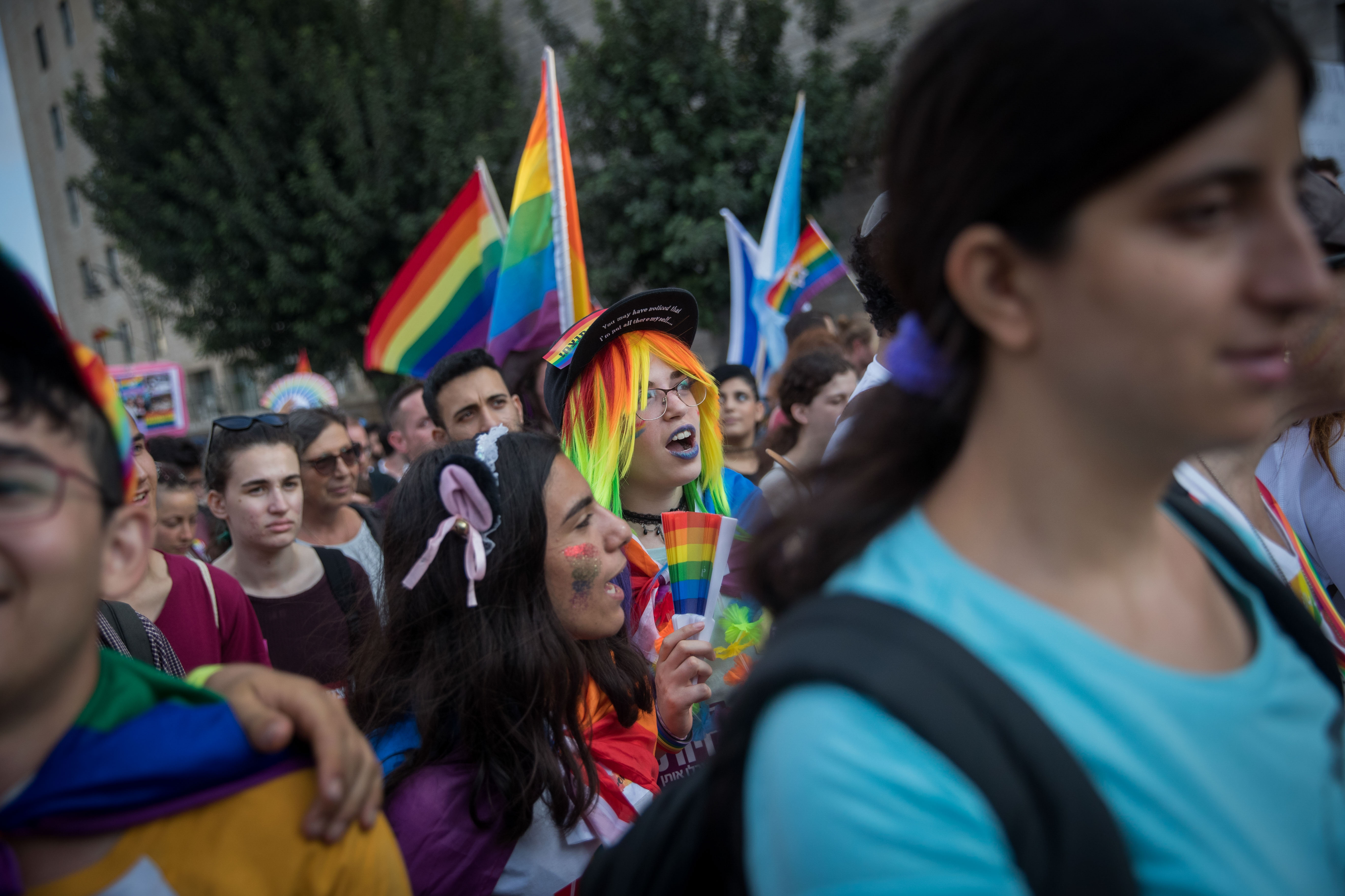 Participants take part in the annual Jerusalem Gay Pride parade on August 2, 2018.   This year's parade, the 17th annual Jerusalem march, is being held under the banner of "Pride and Tolerance". Photo by: JINIPIX