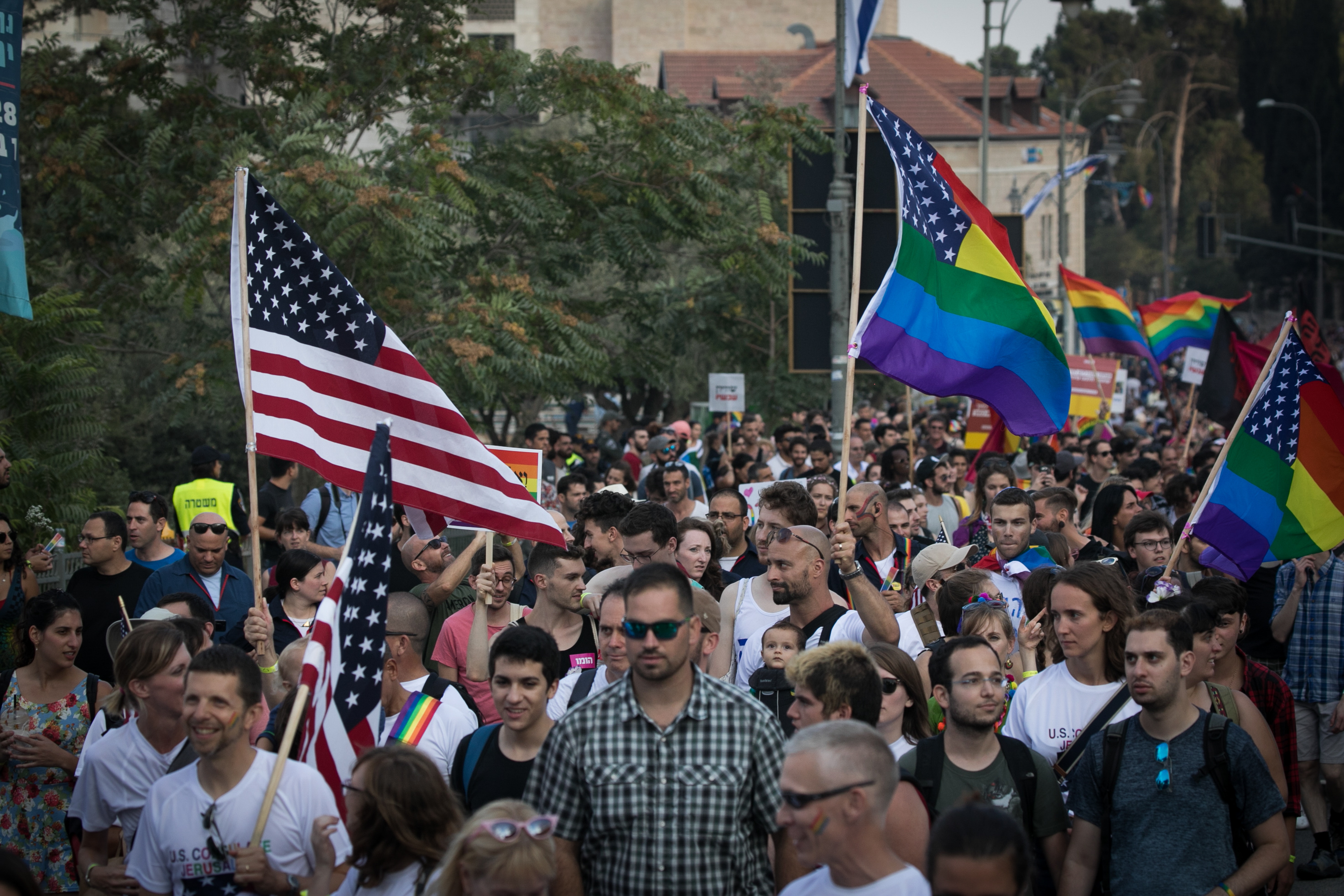 Participants take part in the annual Jerusalem Gay Pride parade on August 2, 2018.   This year's parade, the 17th annual Jerusalem march, is being held under the banner of "Pride and Tolerance". Photo by: JINIPIX