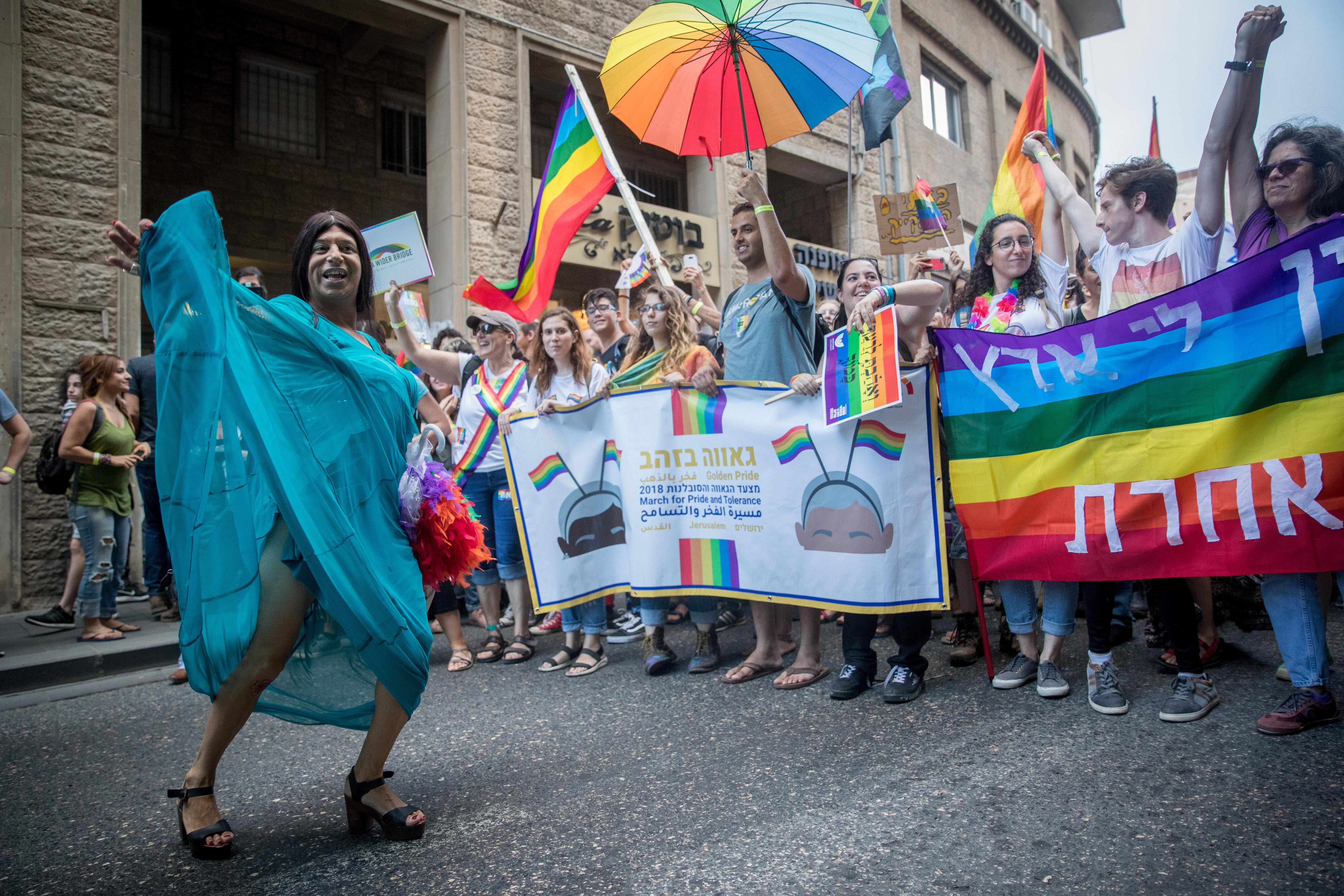 Participants take part in the annual Jerusalem Gay Pride parade on August 2, 2018.   This year's parade, the 17th annual Jerusalem march, is being held under the banner of "Pride and Tolerance". Photo by: JINIPIX