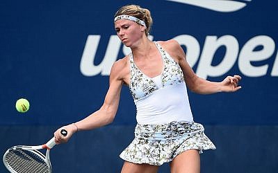 Camila Giorgi was beaten by Venus Williams in the second round of the US Open on Wednesday