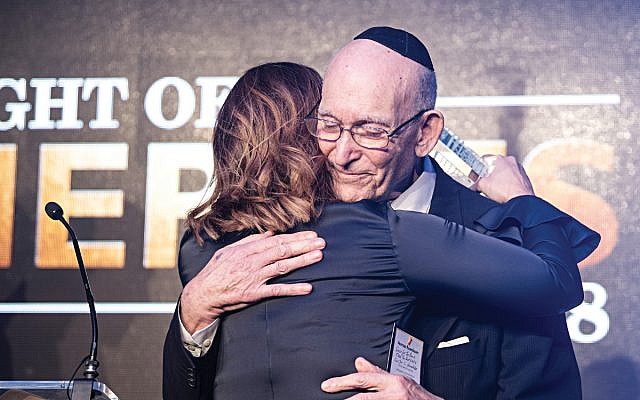 Norman Rosenbaum embracing Kerry Rosenfeld at the the Jewish News' Night of Heroes awards. Credit: Blake Ezra.