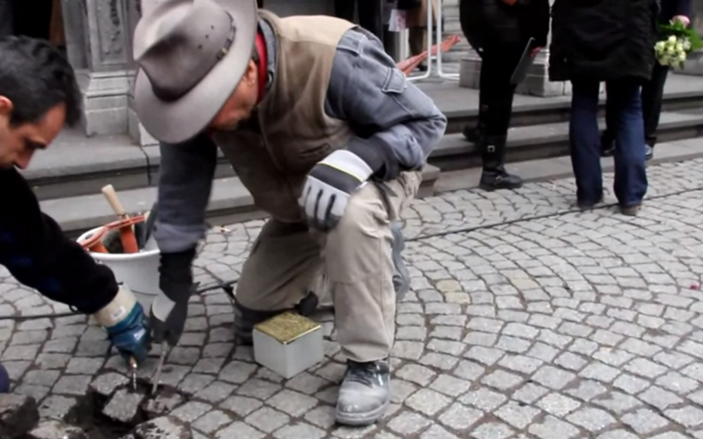 Demnig installs a Stolperstein in Cologne in 2013