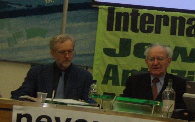 Jeremy Corbyn with survivor Hajo Meyer at the talk in 2010. The banner in the background reads 'international Jewish Anti-Zionist Network'