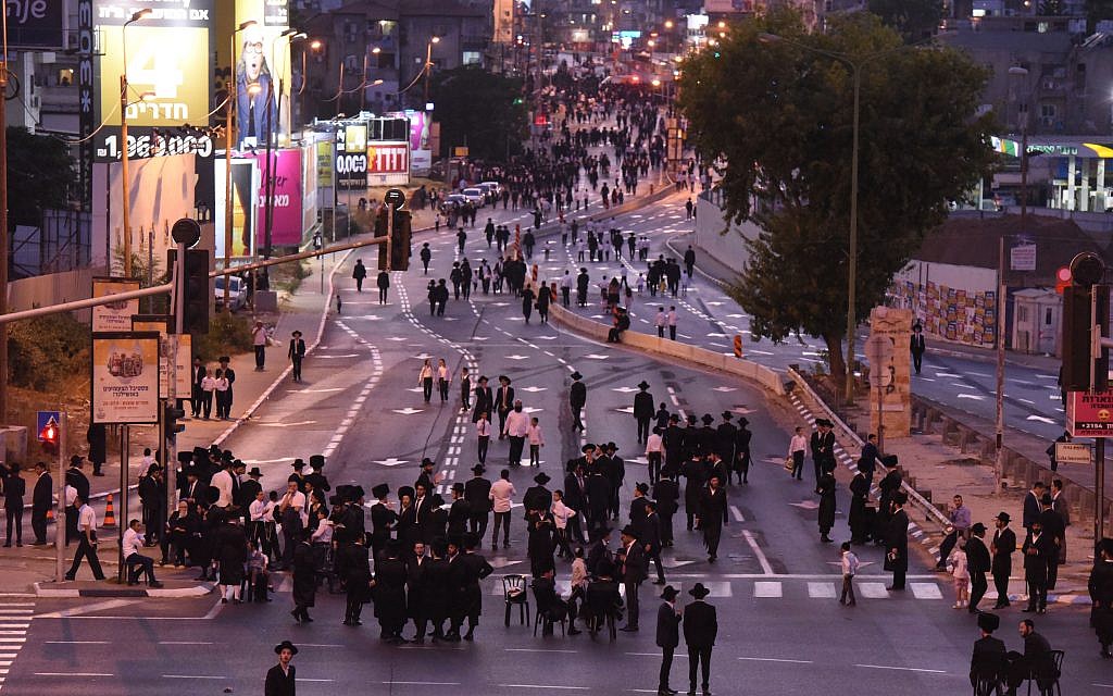 Thousands of Charedim protest against the construction work. Photo by: Reuven Kastro Thousands of Charedim protest against the construction work. Photo by: Reuven Kastro