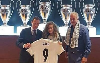Ahed Tamimi, pictured alongside club official Emilio Butragueño and her father