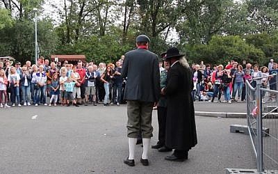 A shot of the skit in Prague, which celebrating Czech nationhood, looked to be mocking an Orthodox Jew