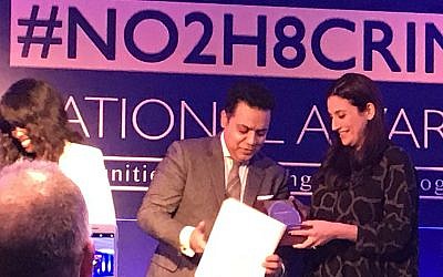 Luciana Berger receiving her award at last night's No2H8 awards. Alongside June Sarpong and