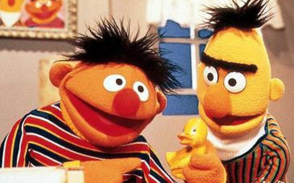 Ernie (left), with his rubber duckie, and Bert (right)